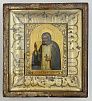 (П) Икона. Серафим Саровский. Конец XIX в. Доска, темпера, позолота. Киот - 28 х 25 см; Доска - ...