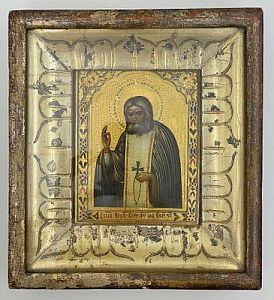 (П) Икона. Серафим Саровский. Конец XIX в. Доска, темпера, позолота. Киот - 28 х 25 см; Доска - ...